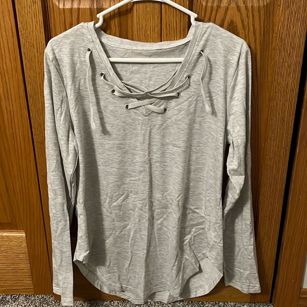 Brand New!! Never worn. Grey long sleeve shirt  size Medium